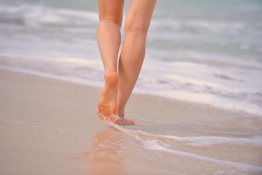 Happy Beautiful Woman Enjoying Summer Vacation on beach