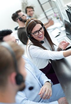 close up.a team of call center operators in the workplace