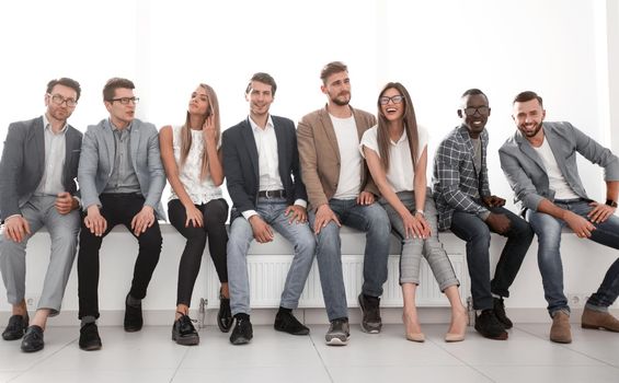 group of young people are waiting for an interview, sitting in the office lobby.photo with copy space