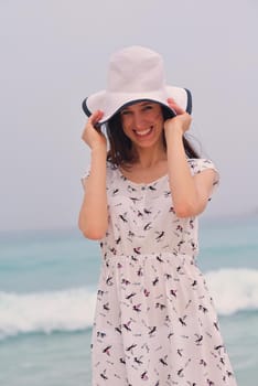 Happy Beautiful Woman Enjoying Summer Vacation on beach