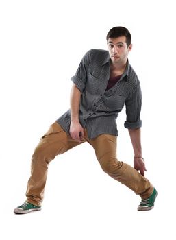 young boy man teen dancing and jumping isolated on white background in studio