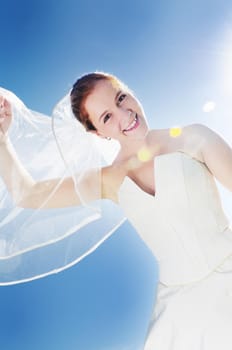 happy young beautiful bride after wedding ceremony event have fun outdoor on meadow at sunset