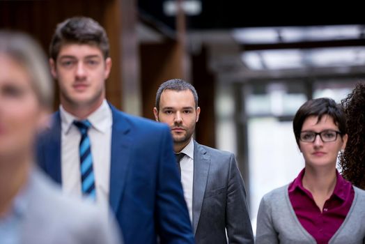 young multi ethnic business people group walking standing and top view