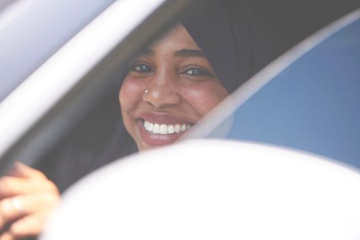 Black African Middle Eastern Woman Traveling By Luxury  Car