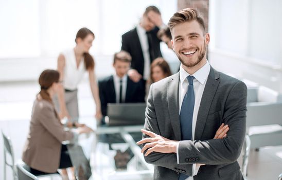 successful businessman standing in the Bank office.business people
