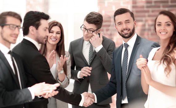 business shaking hands with business partner .the concept of teamwork