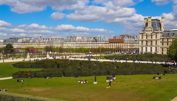 Paris / France - April 04 2019. The Louvre Palace, the labyrinth and marvelous Tuileries garden in Paris city in spring
