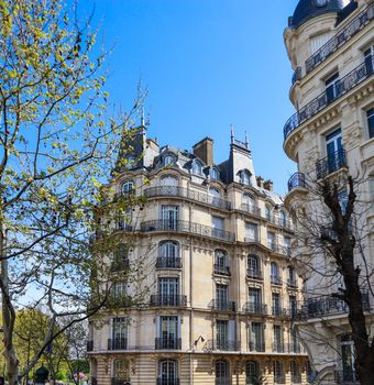 Architecture of Paris France. Facades of a traditional apartment buildings