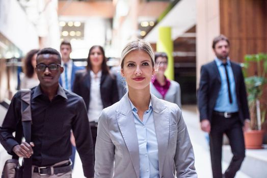 young multi ethnic business people group walking standing and top view