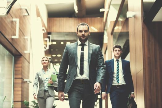 young multi ethnic business people group walking standing and top view