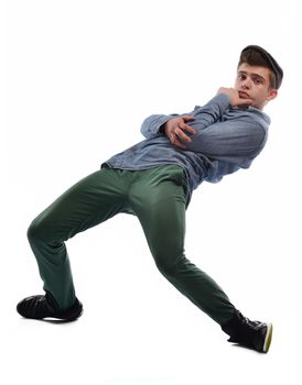 young boy man teen dancing and jumping isolated on white background in studio