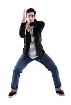 young boy man teen dancing and jumping isolated on white background in studio