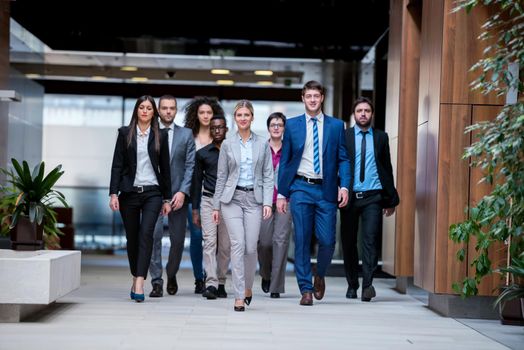 young multi ethnic business people group walking standing and top view