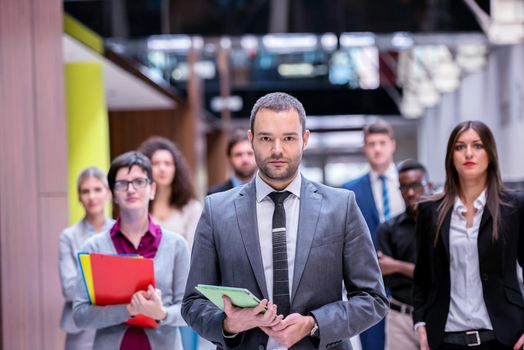 young multi ethnic business people group walking standing and top view