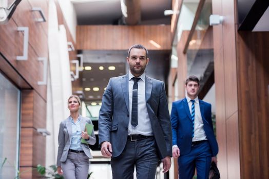 young multi ethnic business people group walking standing and top view