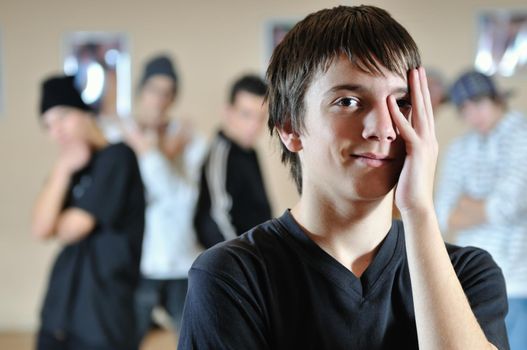 young teen hidding face with hand