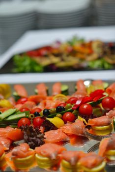 people group catering buffet food indoor in luxury restaurant with meat colorful fruits  and vegetables