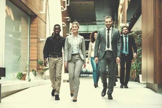 young multi ethnic business people group walking standing and top view