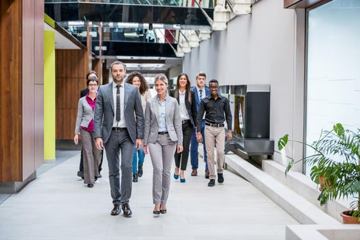 young multi ethnic business people group walking standing and top view