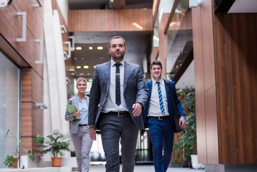 young multi ethnic business people group walking standing and top view