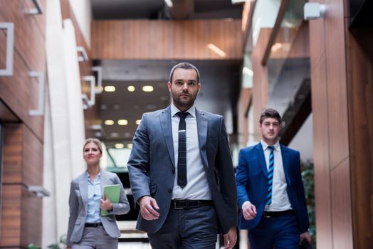 young multi ethnic business people group walking standing and top view