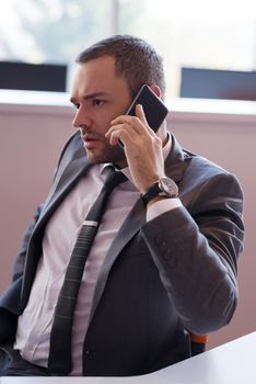 happy young business man portrait in bright modern office indoor