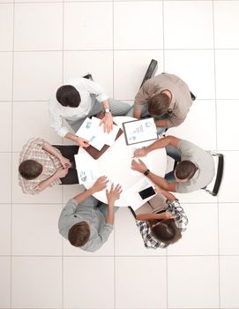 top view.business team discussing financial documents.photo with copy space