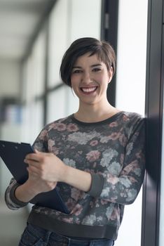 portrait of  young businesswoman in casual hipster clothes at modern startup business office interior