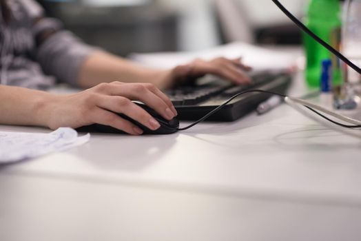 software developer writing programming code on computer