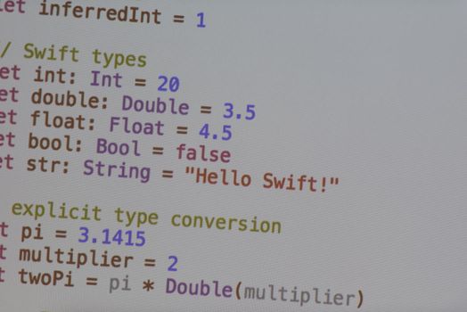 java program code on projector screen at programming class