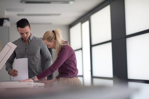 happy business people group at modern office copy  documents on machine