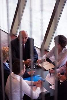 startup business people group have meeting in modern bright office interior, senoir investors  and young software  developers