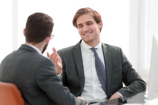 young business partners shake hands.the concept of cooperation