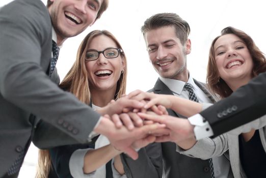 picture of happy business team celebrating victory in office