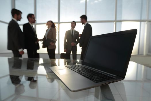 photos of businessmen in a conference room with morning light.