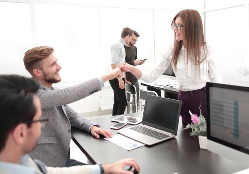 friendly colleagues in the workplace.photo with copy space