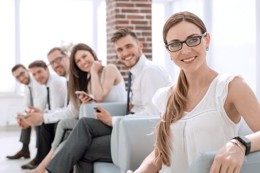 young business woman and colleagues waiting for the meeting. people and technology