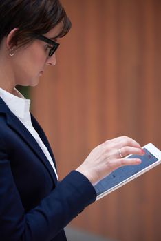 corporate business woman working on tablet computer  at modern office interior