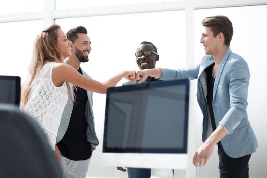 friendly business team in a modern office.the concept of teamwork