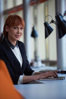 business woman working on computer at modern office