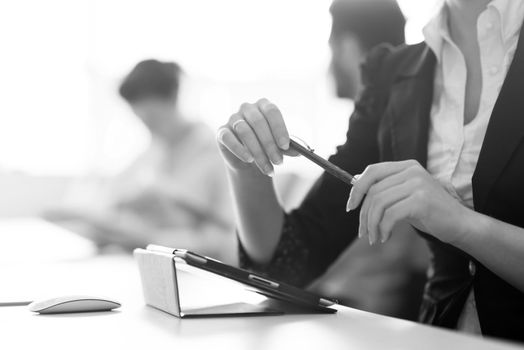 close-up of woman hands holding pen on business meeting