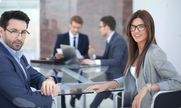 business partners sitting at the office Desk.photo with copy space