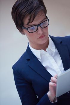 corporate business woman working on tablet computer  at modern office interior