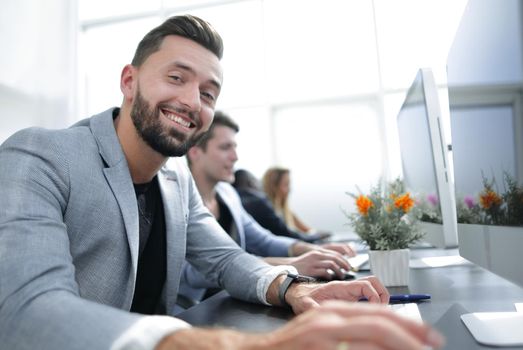 successful businessman working in a computer room.photo with copy space