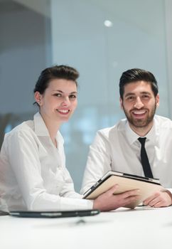 young  business couple portrait at modern bright startup office meeting room  interior