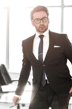 close up.confident businessman standing in the office.business people