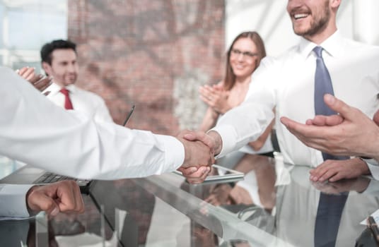 handshake of business people after the signing of the contract. business concept