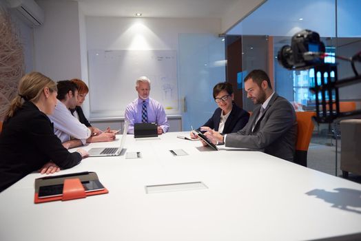 business people group with young adults and senior on meeting at modern bright office interior.