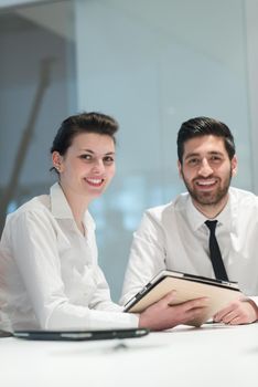 young  business couple portrait at modern bright startup office meeting room  interior