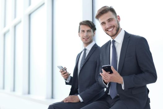 young entrepreneurs sitting in the office waiting room.photo with copy space